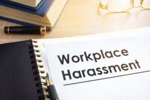 Workkplace Harassmentと書かれたノート