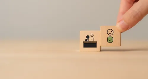 人の絵が描かれたブロックを持つ人